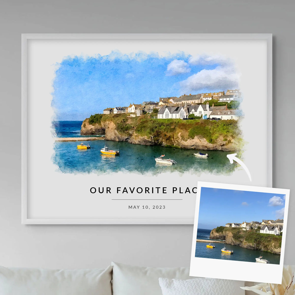 A snapshot of a clifftop harbor village beside its watercolor-style portrait with boats, framed in white